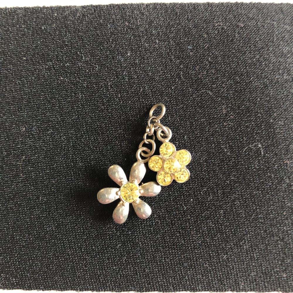 Sterling Silver with Yellow Crystal stones of Two Flower Charms. Very pretty